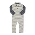 A baby long-sleeve romper with a cream base and thin dark navy horizontal stripes, featuring solid navy sleeves and a matching striped collar.