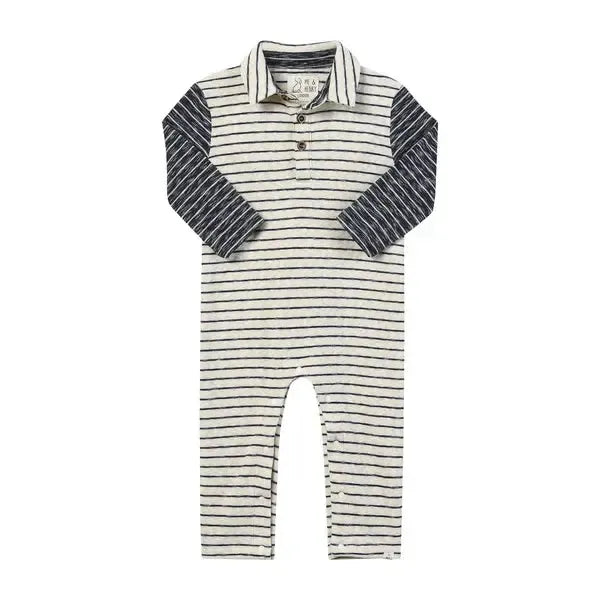 A baby long-sleeve romper with a cream base and thin dark navy horizontal stripes, featuring solid navy sleeves and a matching striped collar.