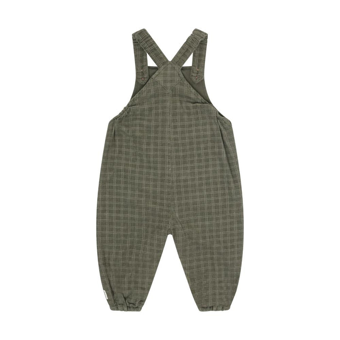 A pair of olive green children's bib overalls with a fine plaid pattern, featuring adjustable shoulder straps that cross over at the back, photographed flat on a white background.