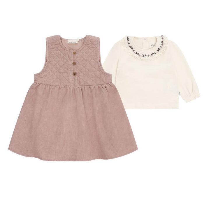 A two-piece baby girl's outfit set on a white background, featuring a sleeveless dusty rose quilted dress with three brown buttons and a cream long-sleeve top with a floral lace collar.