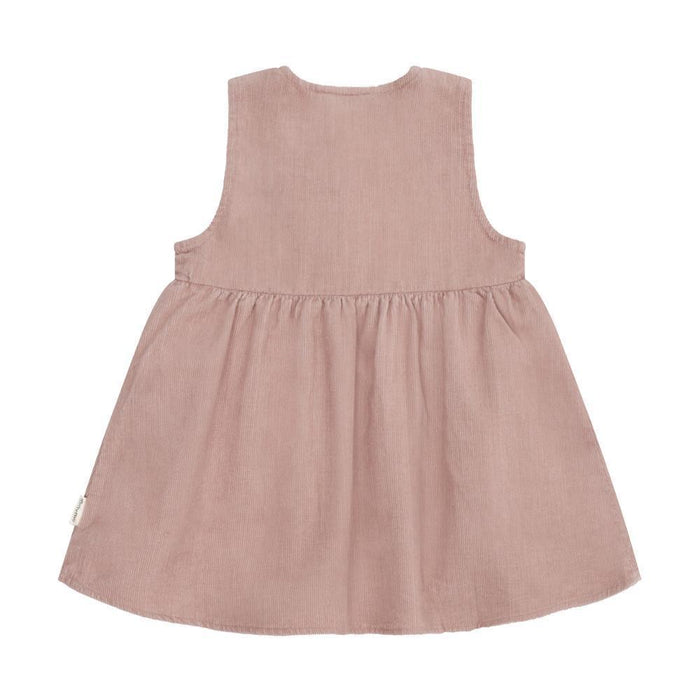 A sleeveless dusty rose pink dress with a gathered waist and flared skirt, shown from the back on a plain white background.