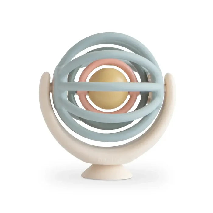 Colorful baby spinning ball pastel hues on a white background
