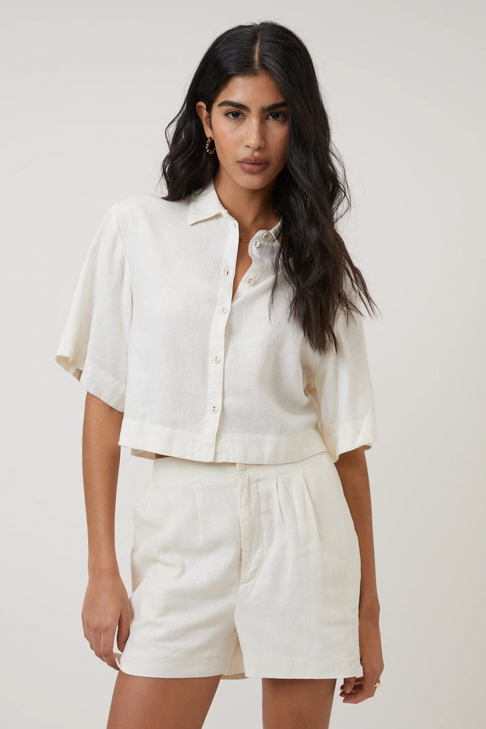 Model wearing Nobody's Child Bennie Linen Blend Cropped Shirt Cream by Nobody’s Child, shop the vendor at Dotique.