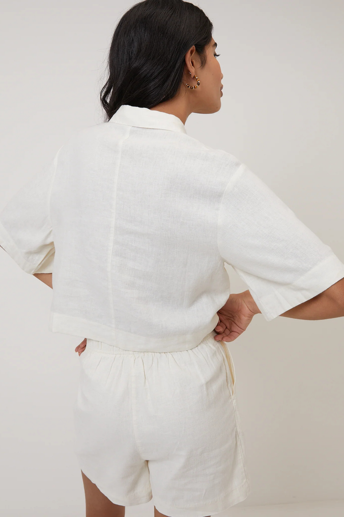 Woman wearing Nobody's Child Bennie Linen Blend Cropped Shirt Cream by Nobody’s Child, shop Nobody’s Child at Dotique.