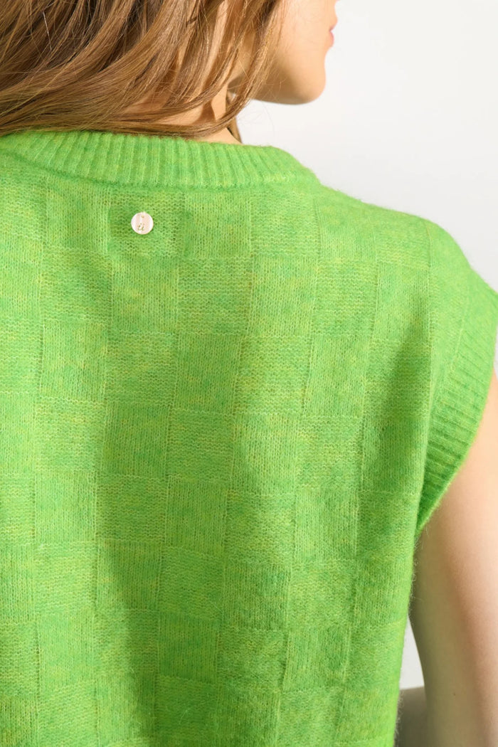 Close-up of the back of a vibrant green knitted vest with subtle check texture, Numph 706928 NURIETTE CHECK VEST – Jasmine Green by Numph. Shop Numph at Dotique.