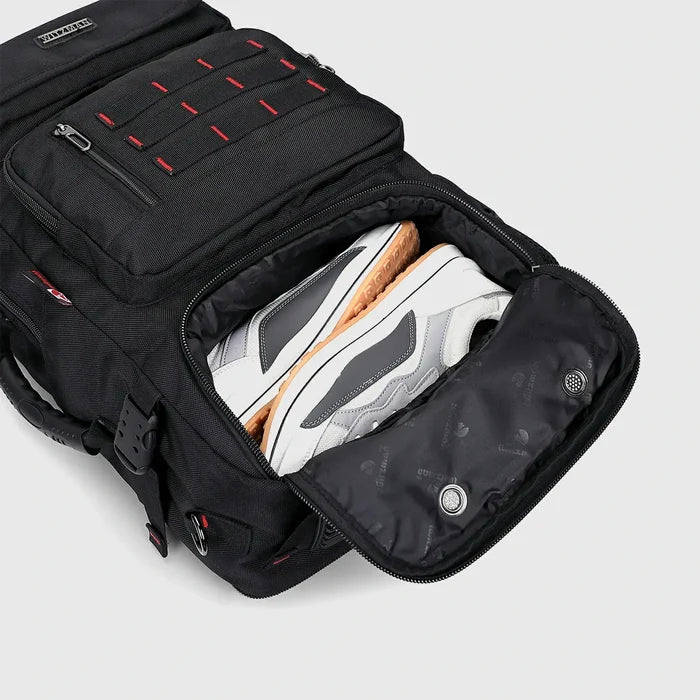 Close-up of separate shoe compartment in black men’s weekend travel backpack