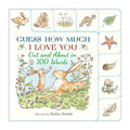 The front cover of the children's board book 'Guess How Much I Love You Out and About in 100 Words' by Anita Jeram, featuring a cream-colored background with whimsical illustrations of animals, plants, and nature elements.