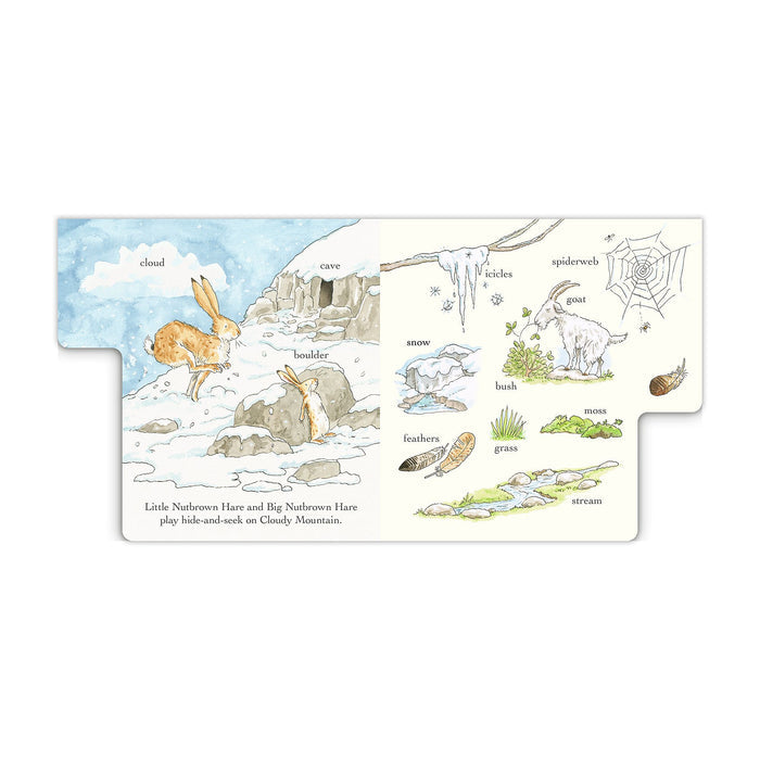 A children's educational activity board featuring a winter scene with labeled illustrations of animals and natural elements, photographed on a plain white background.