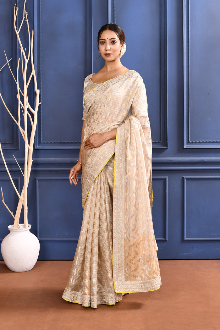 Pastel Golden Embroidered Tissue Saree