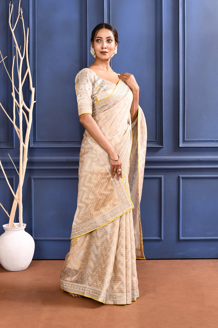 Pastel Golden Embroidered Tissue Saree