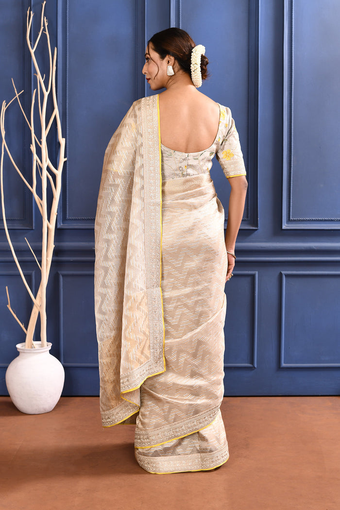 Pastel Golden Embroidered Tissue Saree