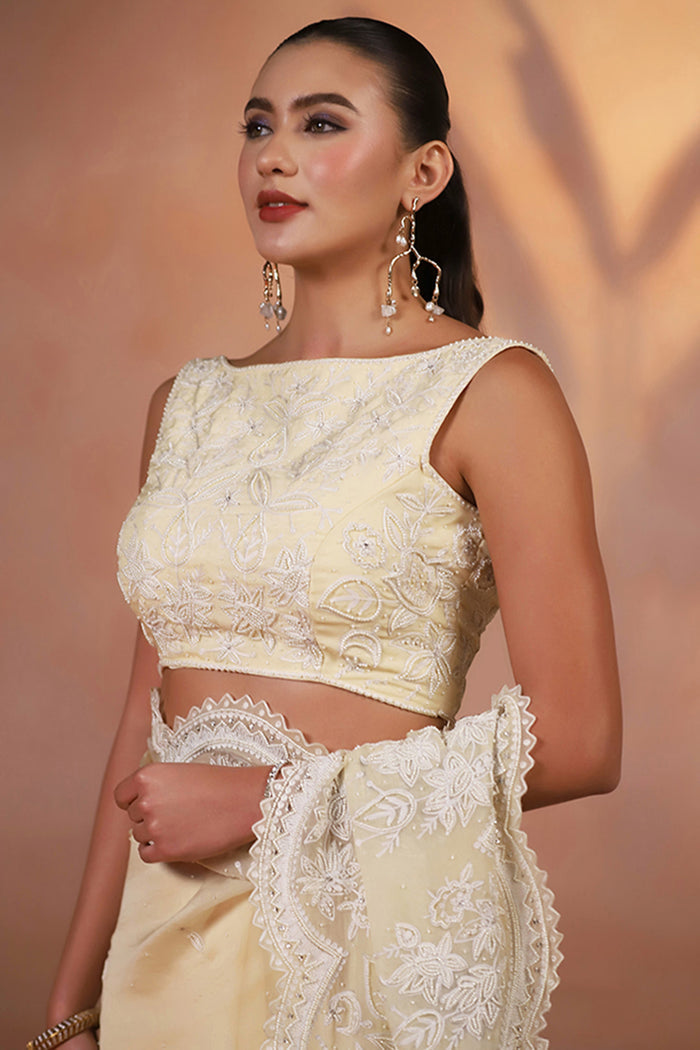 Pastel Yellow Thread Embroidered Organza Saree