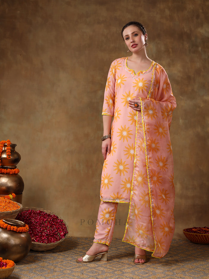 Peach Sunburst Printed Georgette Salwar Set With Yellow Accent Piping
