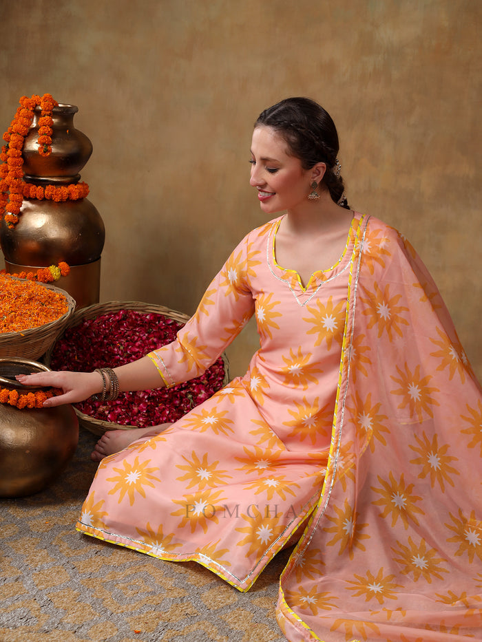 Peach Sunburst Printed Georgette Salwar Set With Yellow Accent Piping