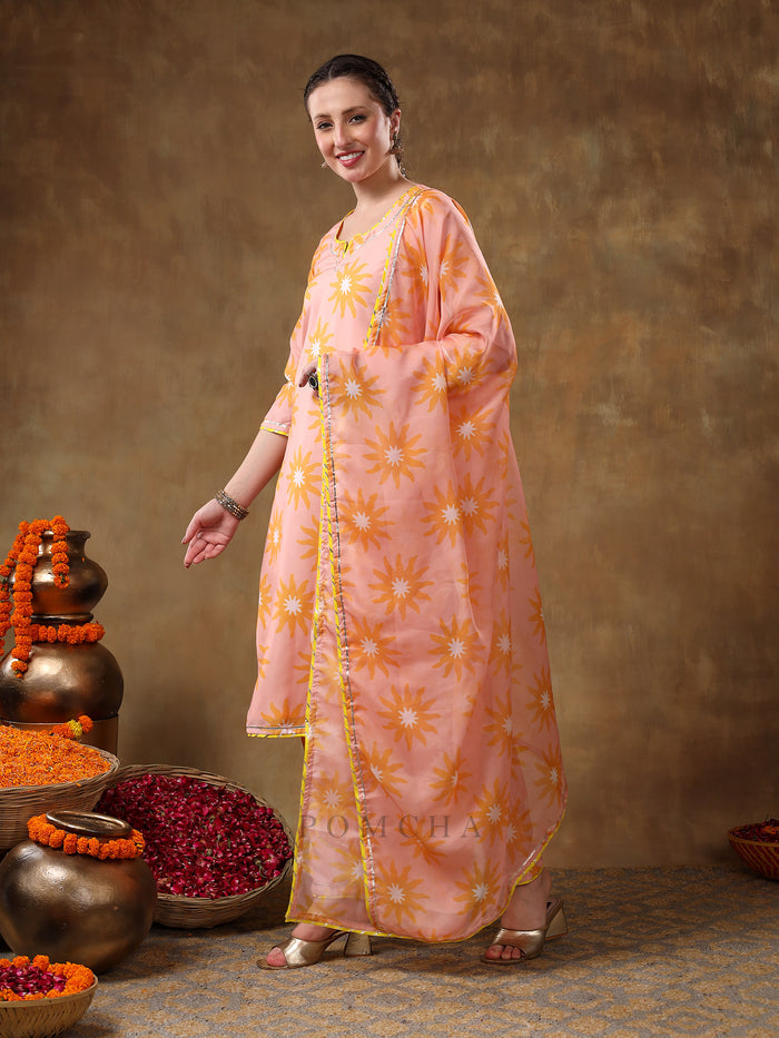 Peach Sunburst Printed Georgette Salwar Set With Yellow Accent Piping