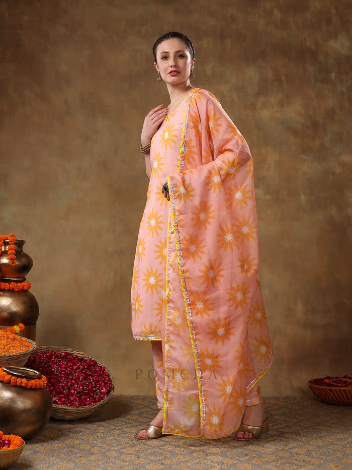 Peach Sunburst Printed Georgette Salwar Set With Yellow Accent Piping