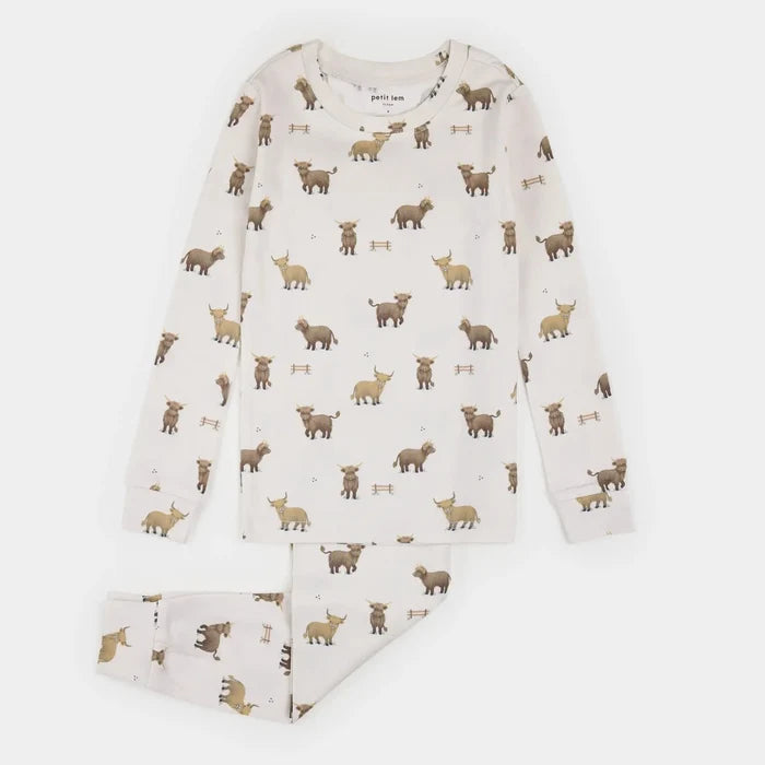 A two-piece children's pajama set featuring a long-sleeve top and matching pants, printed with a repeating pattern of brown and tan Highland cows on an off-white background.