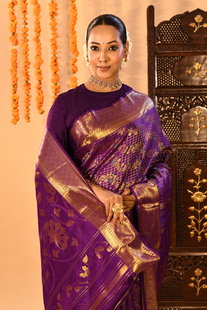 Purple With Gold Zari Jaal Weave And Floral Butta Pallu On Kanjivaram Silk Saree