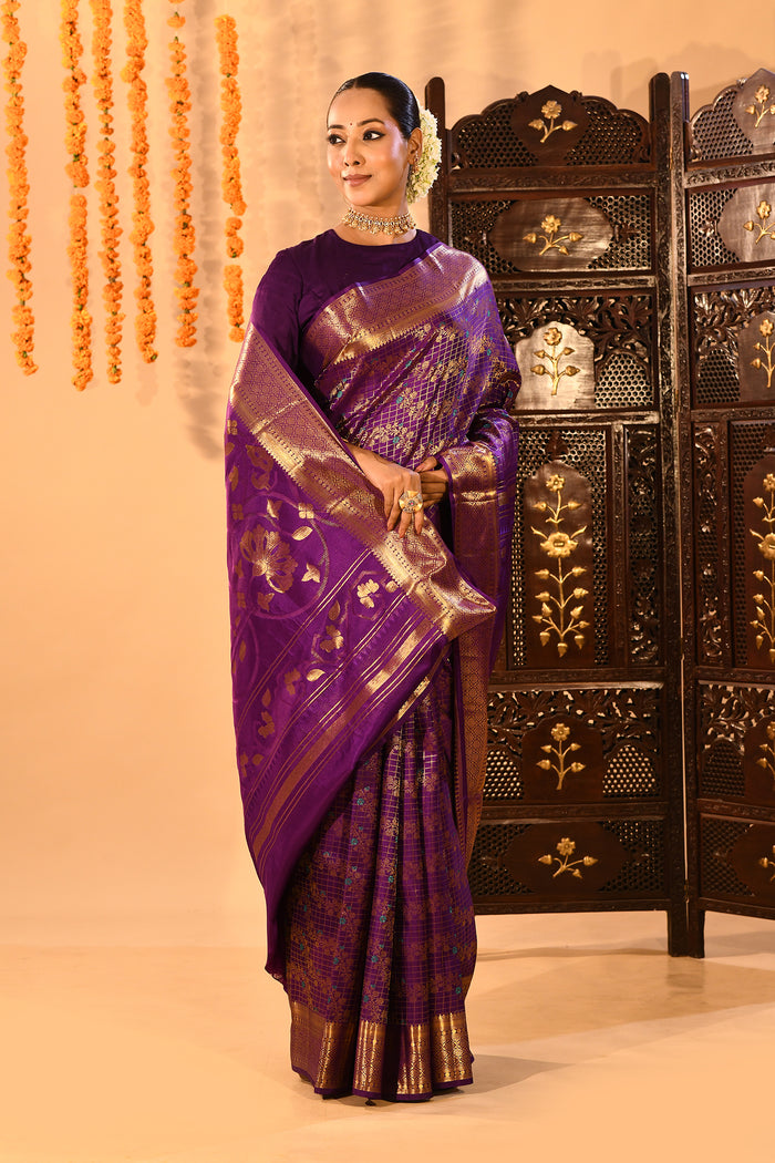 Purple With Gold Zari Jaal Weave And Floral Butta Pallu On Kanjivaram Silk Saree