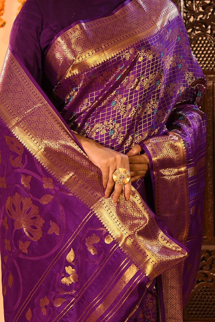 Purple With Gold Zari Jaal Weave And Floral Butta Pallu On Kanjivaram Silk Saree