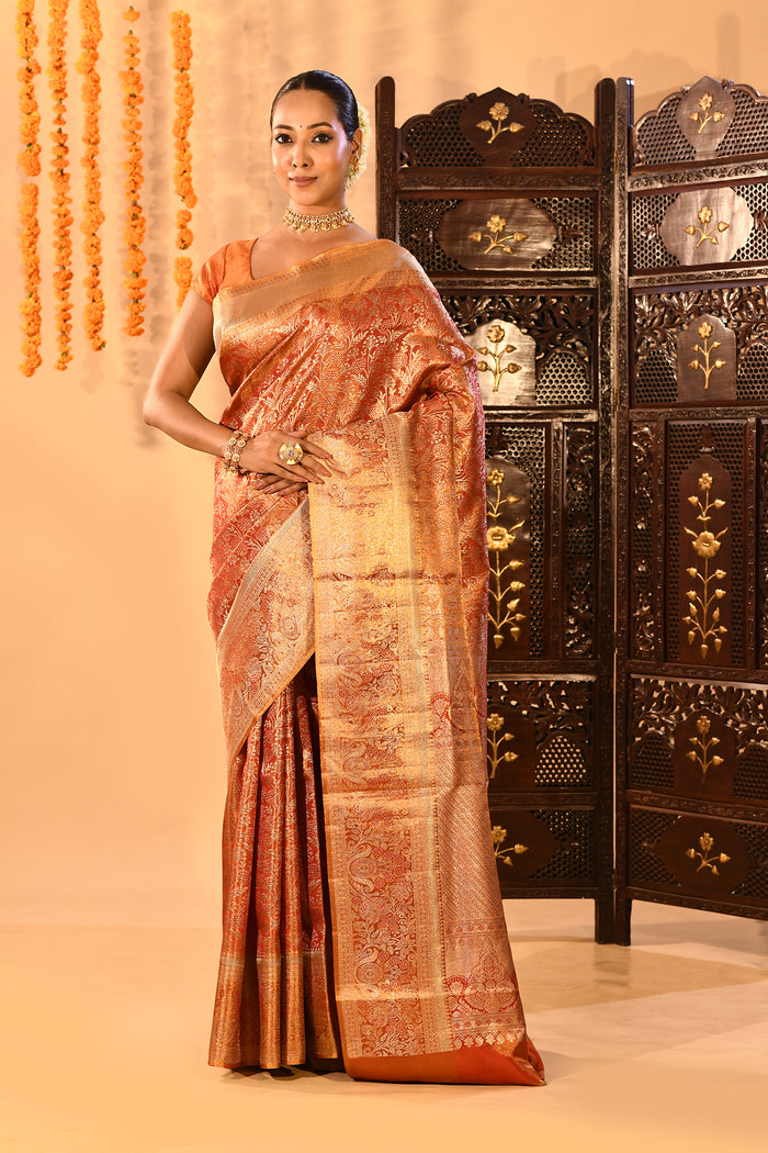 Resplendent Peach Orange Kanjivaram Tissue Silk Saree With Ornate Floral Jaal