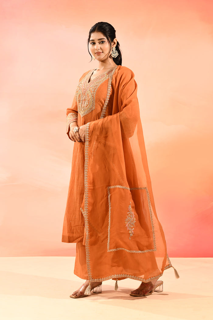Rust Orange Anarkali Set With Embroidered Neckline And Gota Border Dupatta