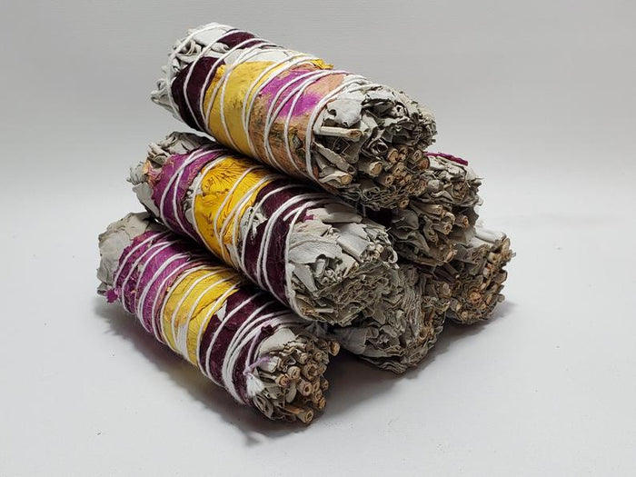 Sage: White Sage with Rose Petals wrapped around the bundle.