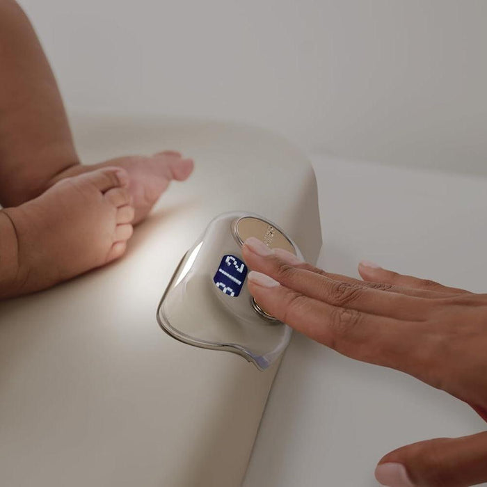 Picture depicting light mode on changing pad