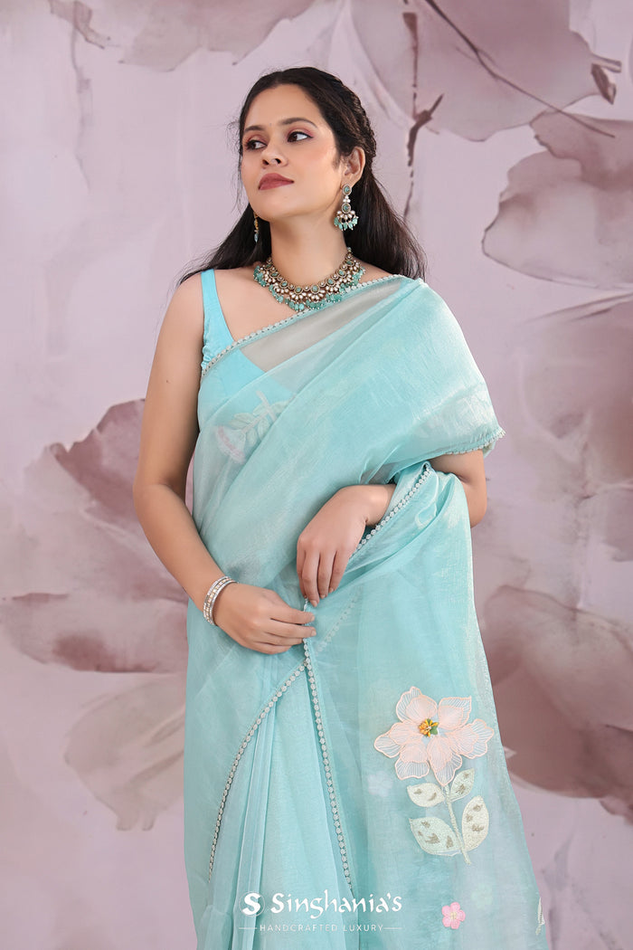 <img>  blue organza tissue saree with embroidery work