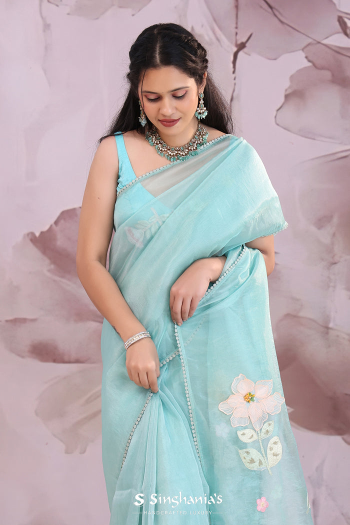 <img>  blue organza tissue saree with embroidery work