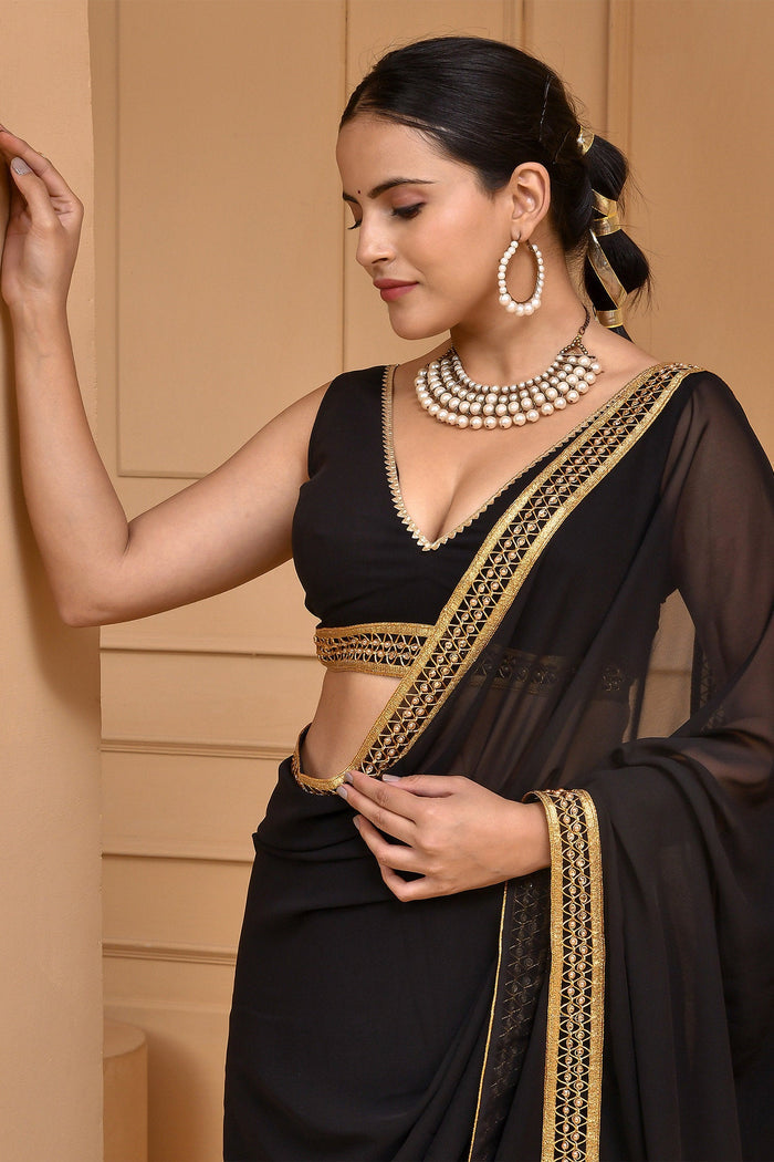 <img> Smooth Black Georgette Saree With Lace Work Border