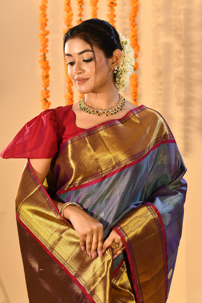 Steel Blue With Purple Contrast Border And Gold Zari Buttis On Kanjivaram Silk Saree