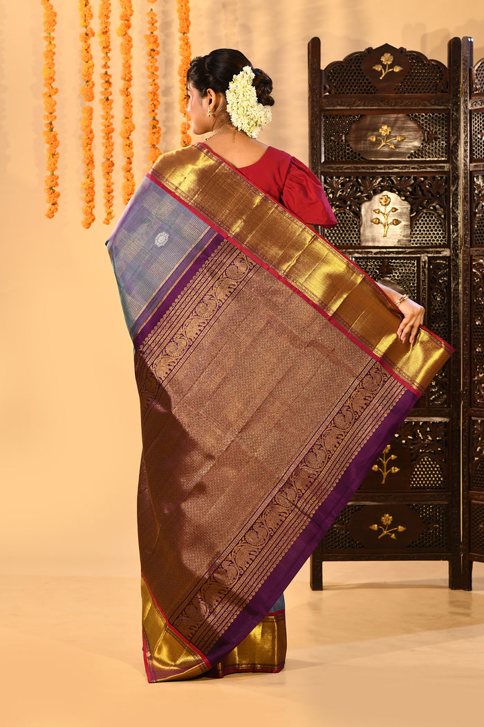 Steel Blue With Purple Contrast Border And Gold Zari Buttis On Kanjivaram Silk Saree