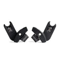 A pair of black Stokke YOYO car seat adapters.