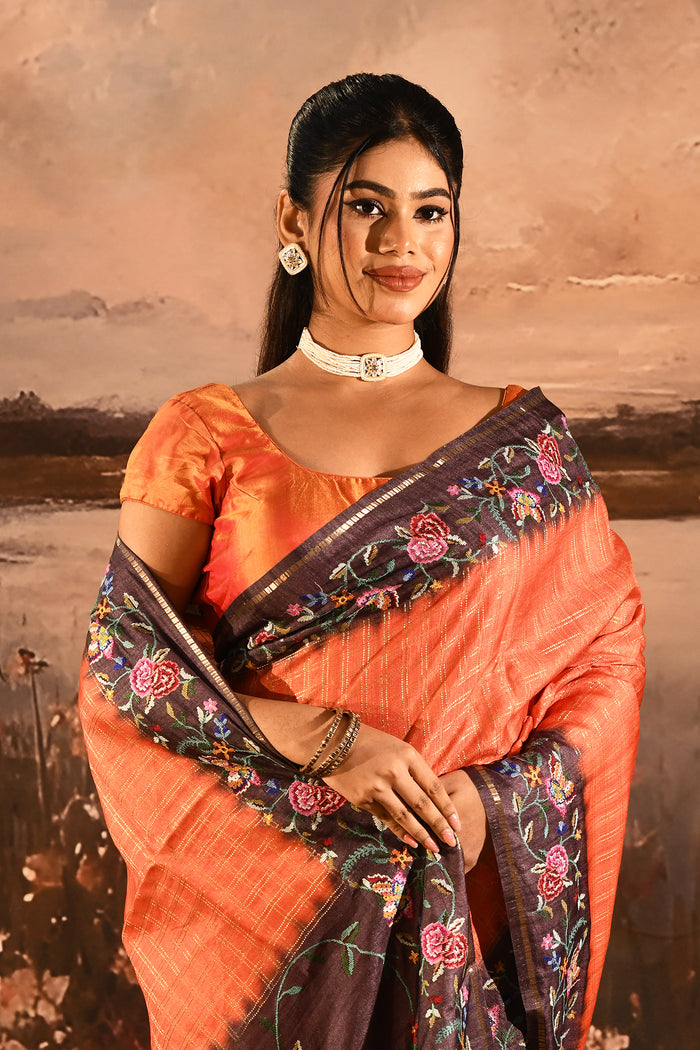 Tangerine With Checks And Multi Colored Floral Border Embroidery Designer Saree