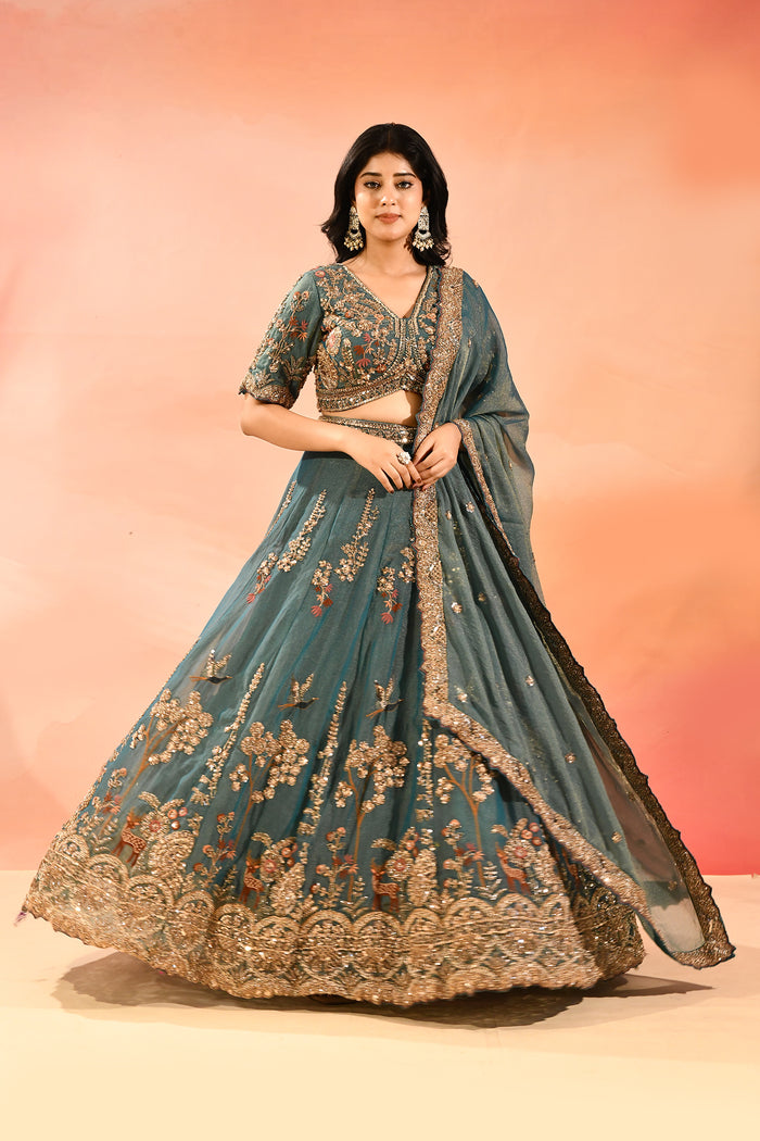 Teal Blue Animal And Floral Embroidered Tissue Lehenga