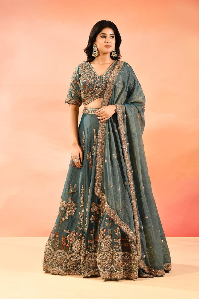 Teal Blue Animal And Floral Embroidered Tissue Lehenga
