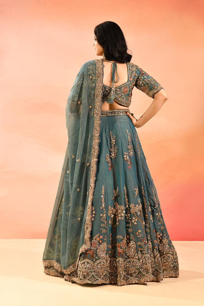 Teal Blue Animal And Floral Embroidered Tissue Lehenga