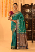 Teal Green With Gold Zari Butti And Bronze Woven Pallu Kanjivaram Silk Saree