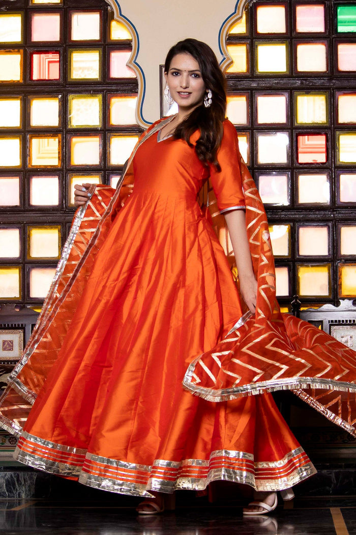 <img> Tiger Orange Taffeta Silk Anarkali Set With Zari Woven Dupatta
