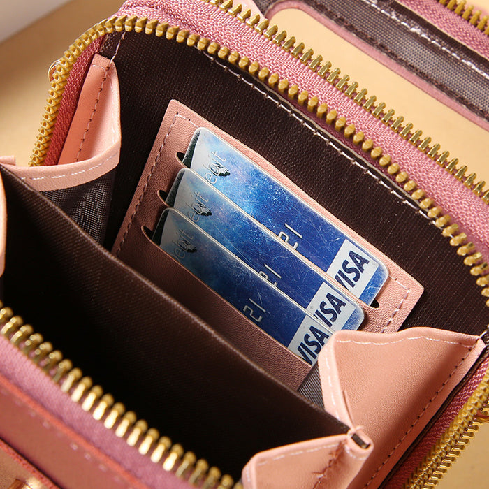 Touchscreen crossbody phone bag detail showing three dedicated card slots for organized card storage