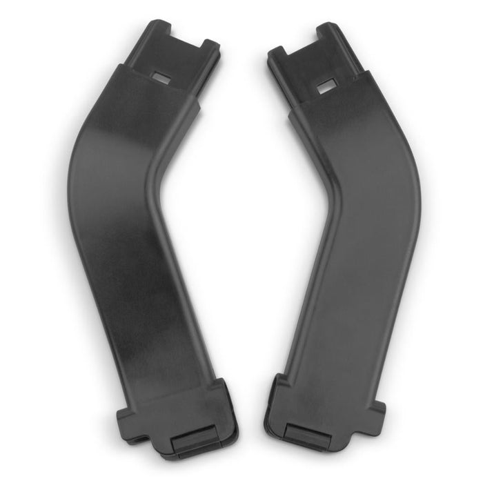 Two black car seat adapters on a white background