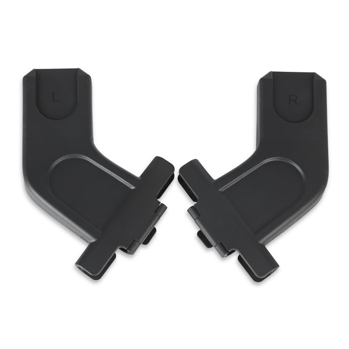Black car seat adapters on a white background