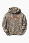 A camouflage hoodie featuring a woodland tree-bark pattern in shades of brown, beige, and gray, with the word 'UPSTATE' printed in orange arched across the chest.