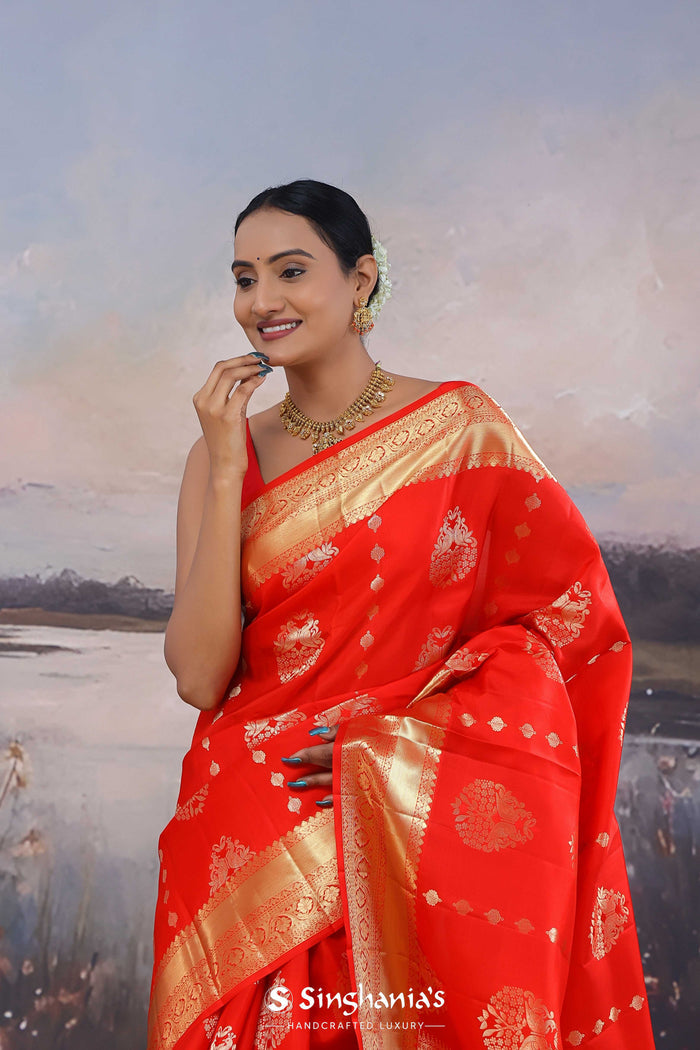 Vibrant Orange Kanjivaram Saree With Gold Zari Border