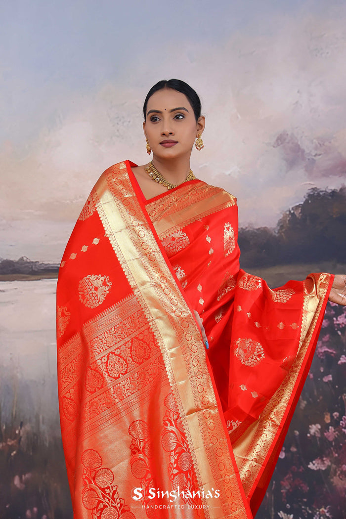Vibrant Orange Kanjivaram Saree With Gold Zari Border