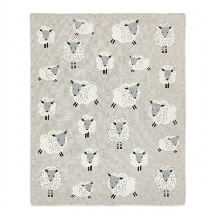 A square area rug featuring a repeating pattern of stylized white and gray sheep on a light beige background.