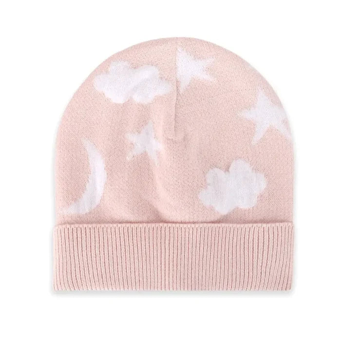 A light pink knit beanie hat with a ribbed cuff, decorated with white embroidered stars, crescent moon, and clouds, shown on a plain white background.