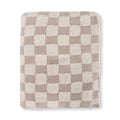 A folded textured throw blanket featuring a beige and off-white checkerboard pattern, shown against a plain white background.