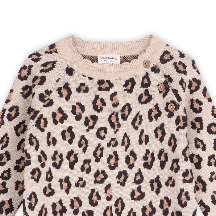 Leopard print sweater with a brand label on a white background